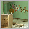 On the wall: the scene from the russian fairy tale about the oldman and turnip ("Repka")